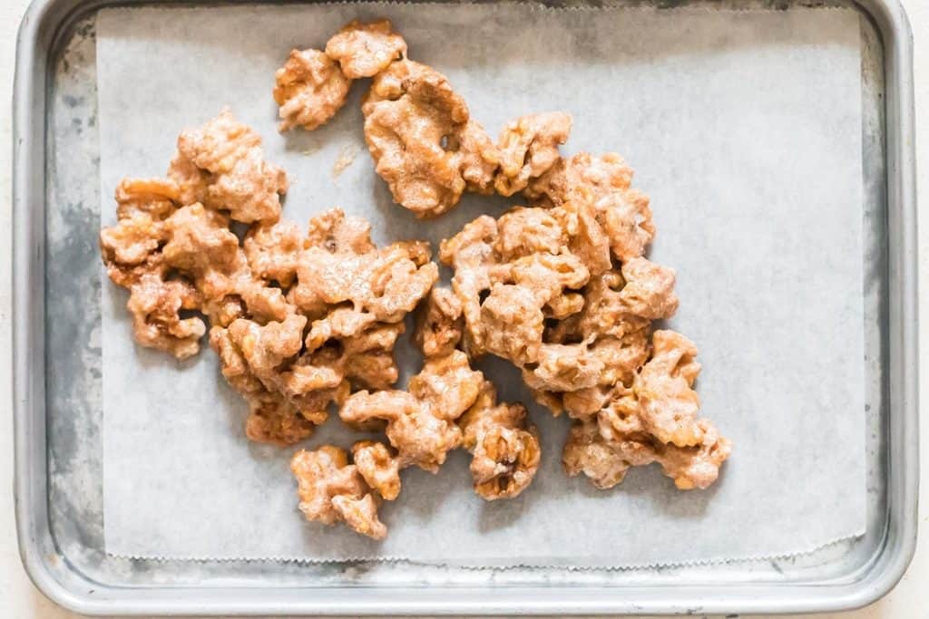 candy walnuts arranged on baking tray