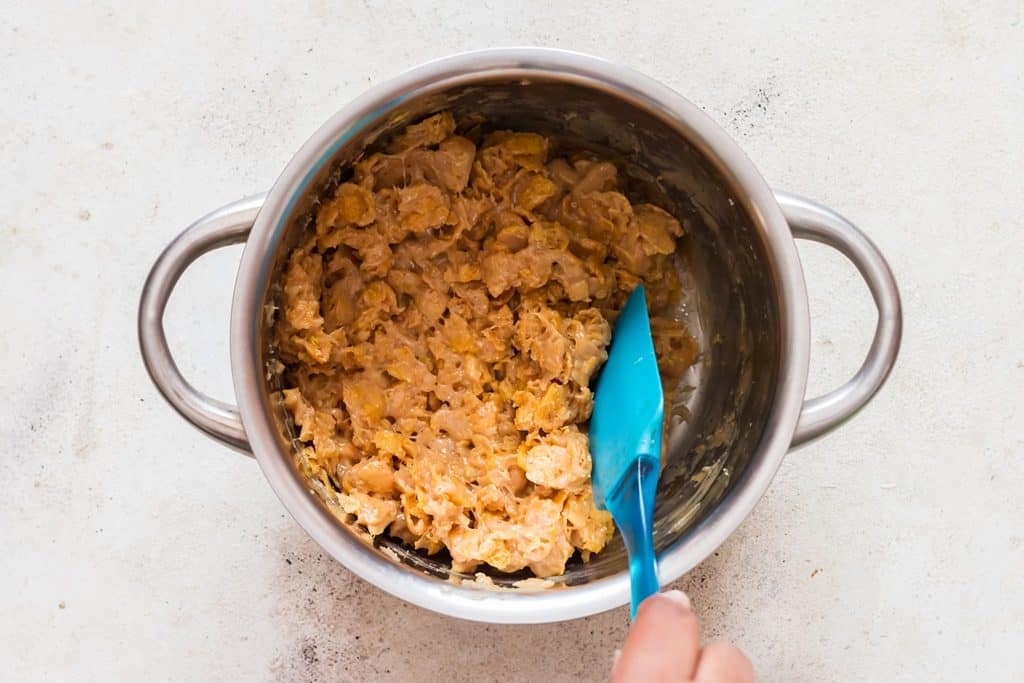 making cornflakes cookies with peanut butter