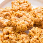 cornflake cookies on white plate with text overlay