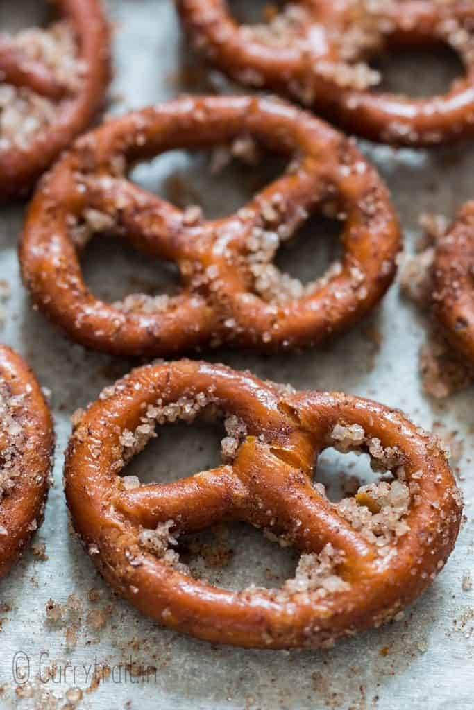 baked cinnamon coated pretzels on baking tray