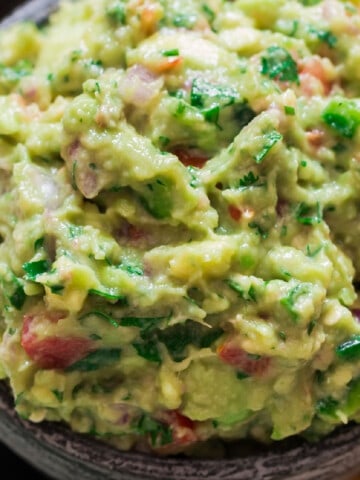 chunky guacamole with nachos