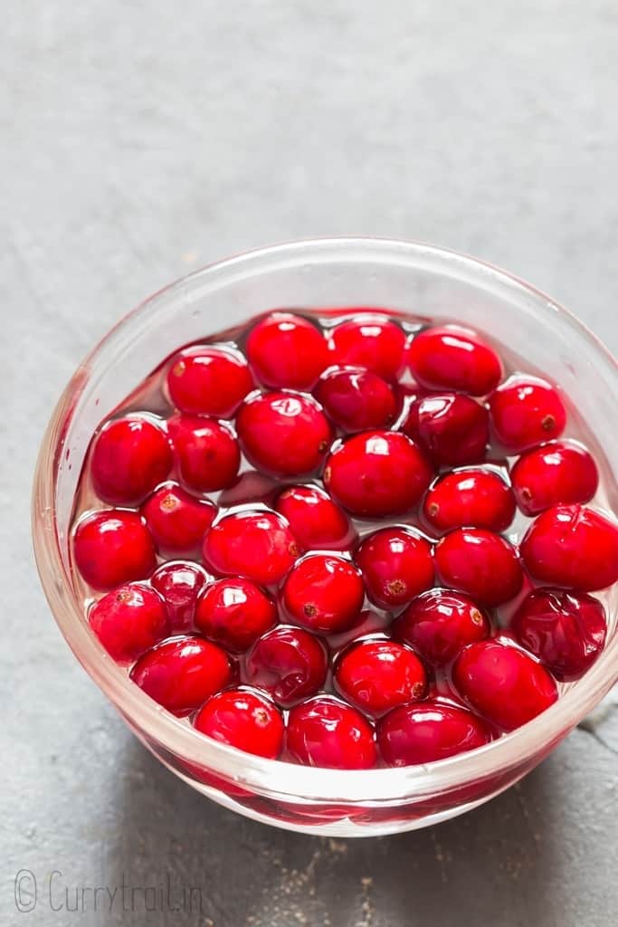 soakign fresh cranberries in simple syrup