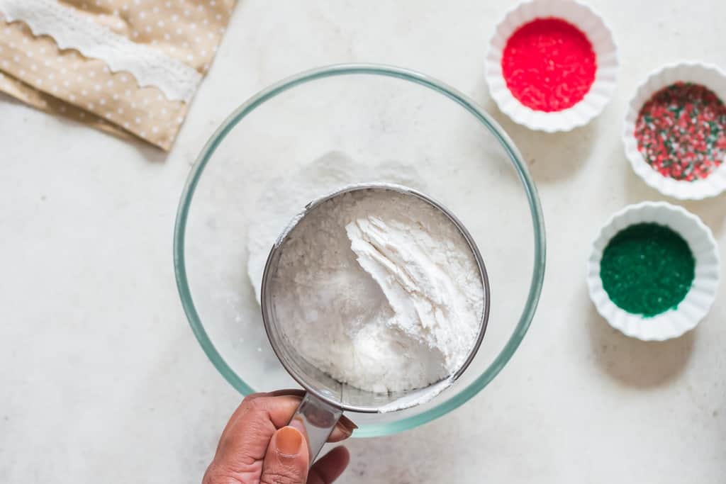 sieve dry ingredients for soft sugar cookie recipe
