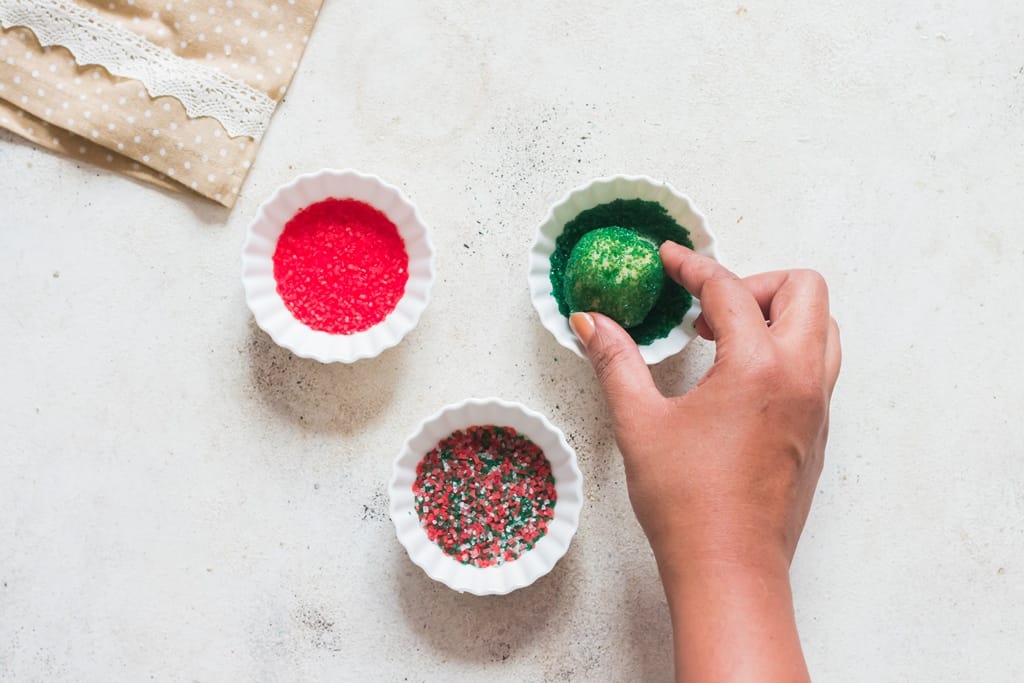 coating cookie dough in sparkling sugar