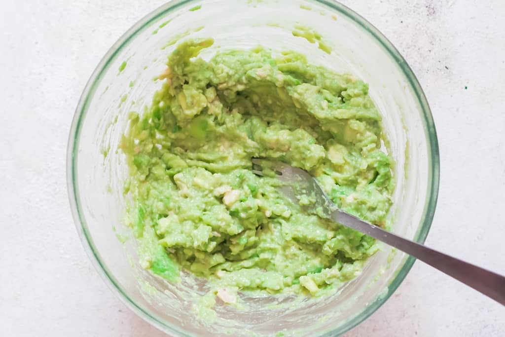 avocado mashed with fork