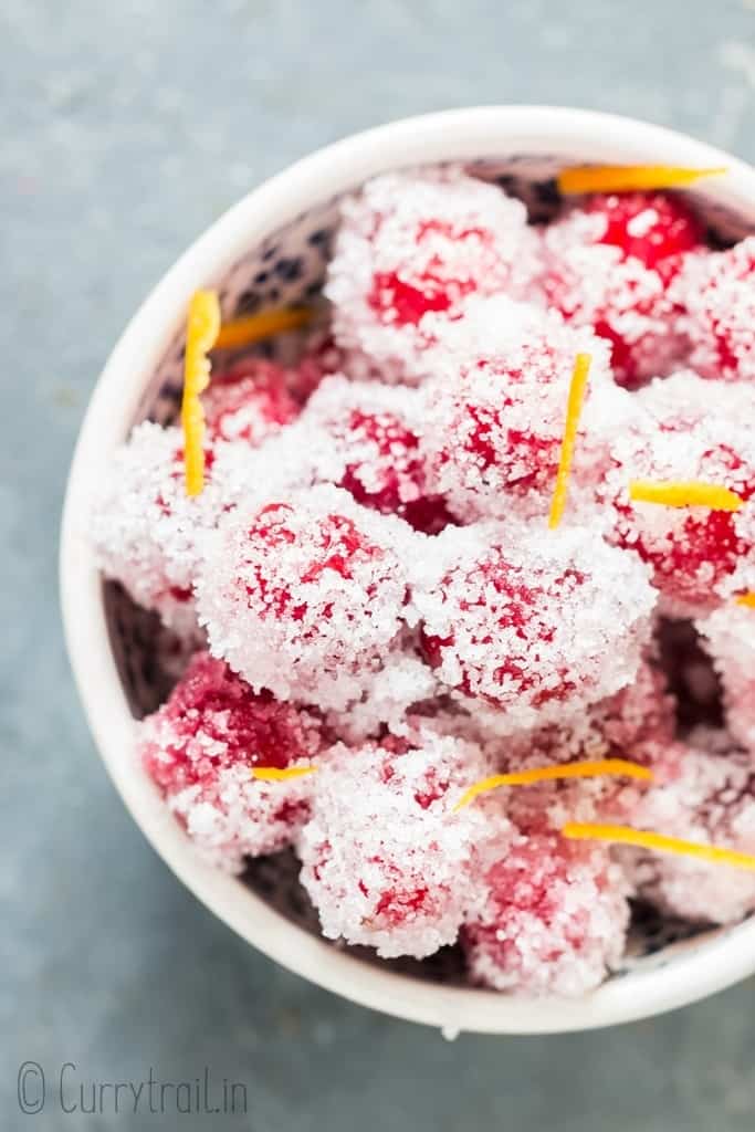 sugar coated cranberries in white bowl