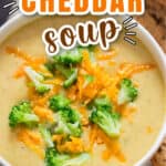 broccoli and cheddar soup in white bowl with text overlay