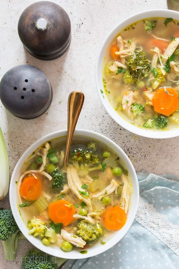 chicken detox soup in two soup bowls