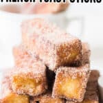 cinnamon french toast sticks on white plate with text