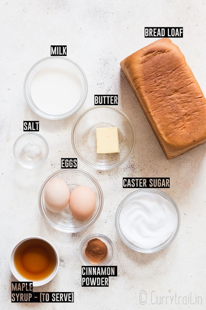 French toast sticks ingredients arranged on white board