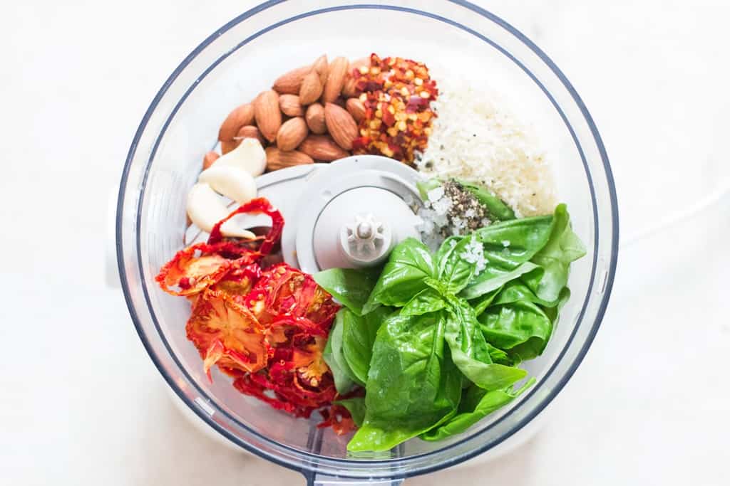 sun-dried tomato pesto ingredients in a food processor.