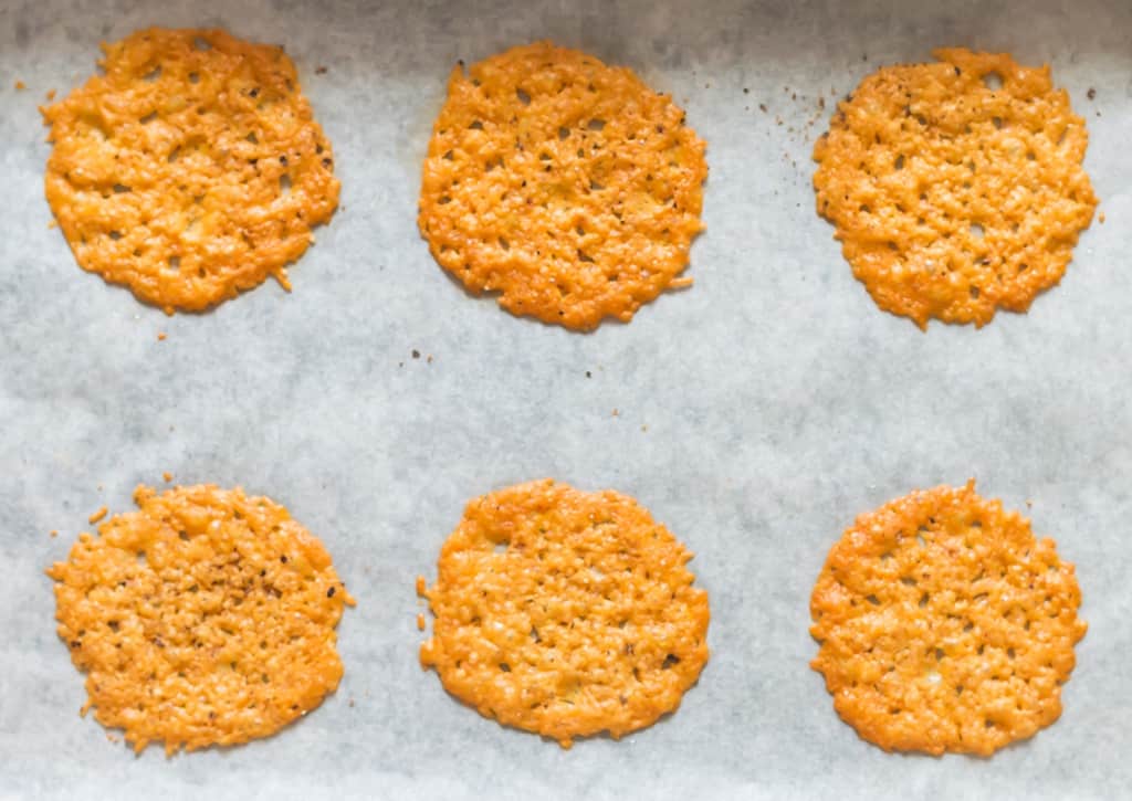 baked cheese crisps on baking tray