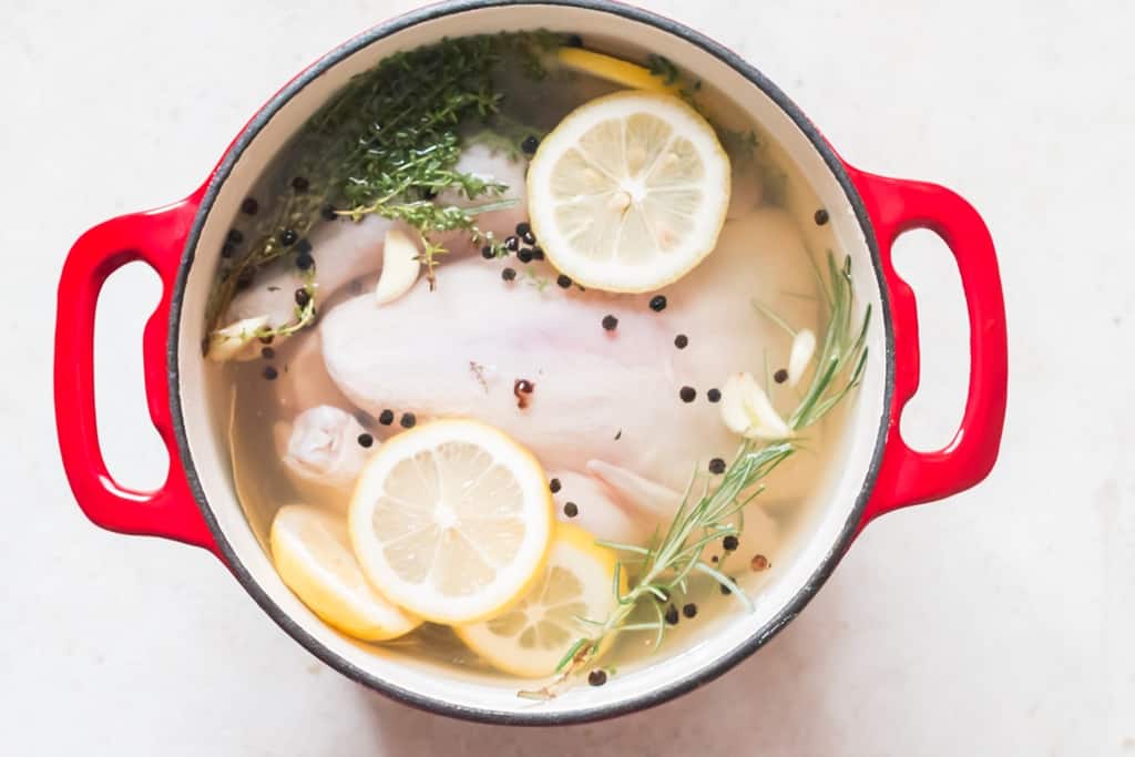 whole chicken placed in large pot