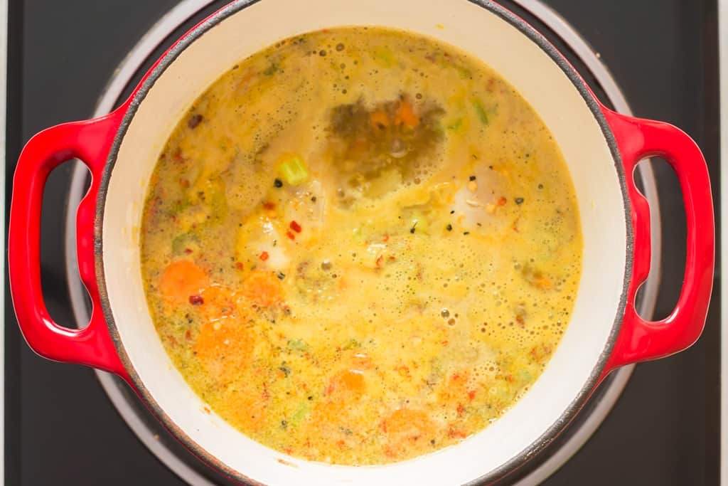 boiling chicken detox soup in soup pot