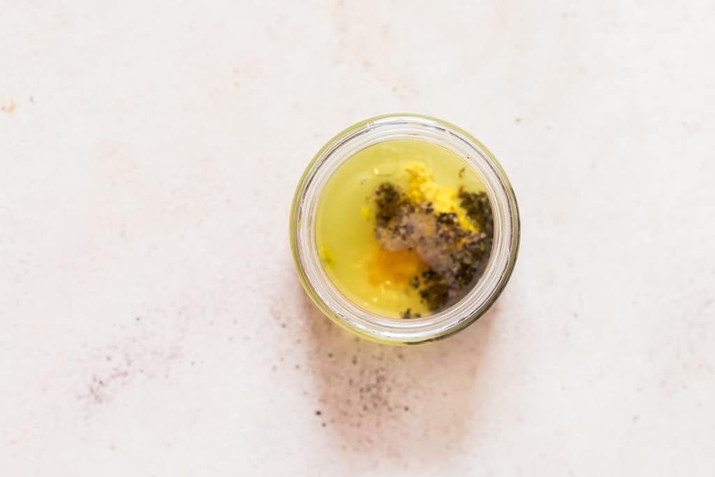 making salad dressing in a jar