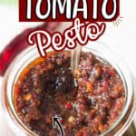 sun dried tomato pesto in glass jar with text