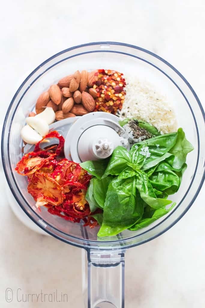 all ingredients for sun dried tomato pesto in food processor