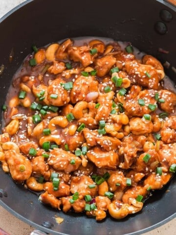 cashew chicken cooked in black wok