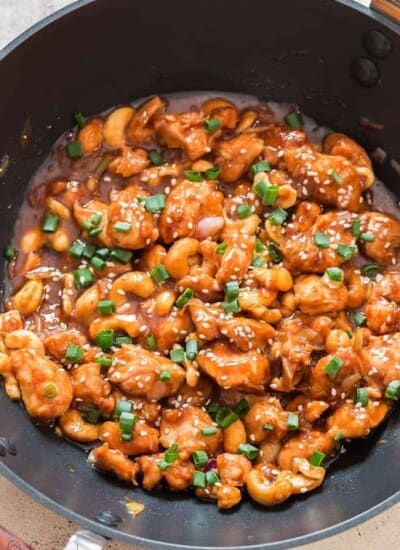 cashew chicken cooked in black wok