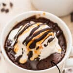 chocolate mug cake made in white mug with text overlay