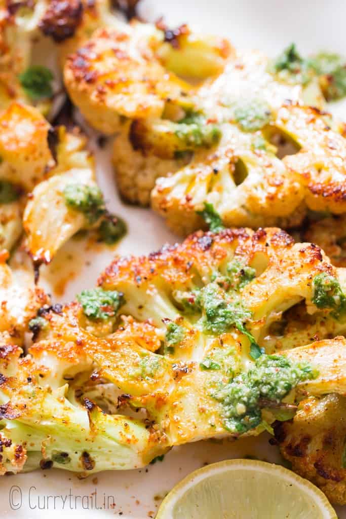 healthy overn roasted cauliflower steaks served with chimichurri sauce