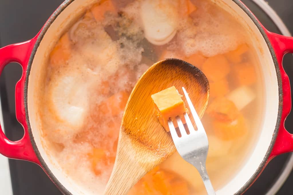 sweet potatoes cooked until tender in large pot to make mashed sweet potatoes