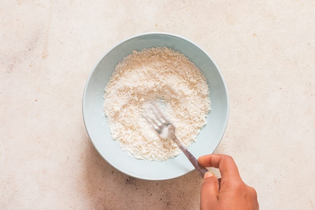 shredded coconut and panko bread crumbs mix for making coconut shrimp.