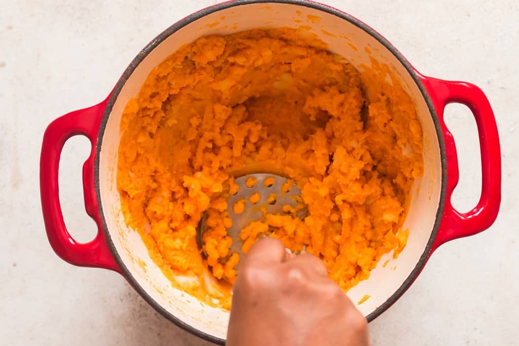 mash sweet potatoes using hand masher