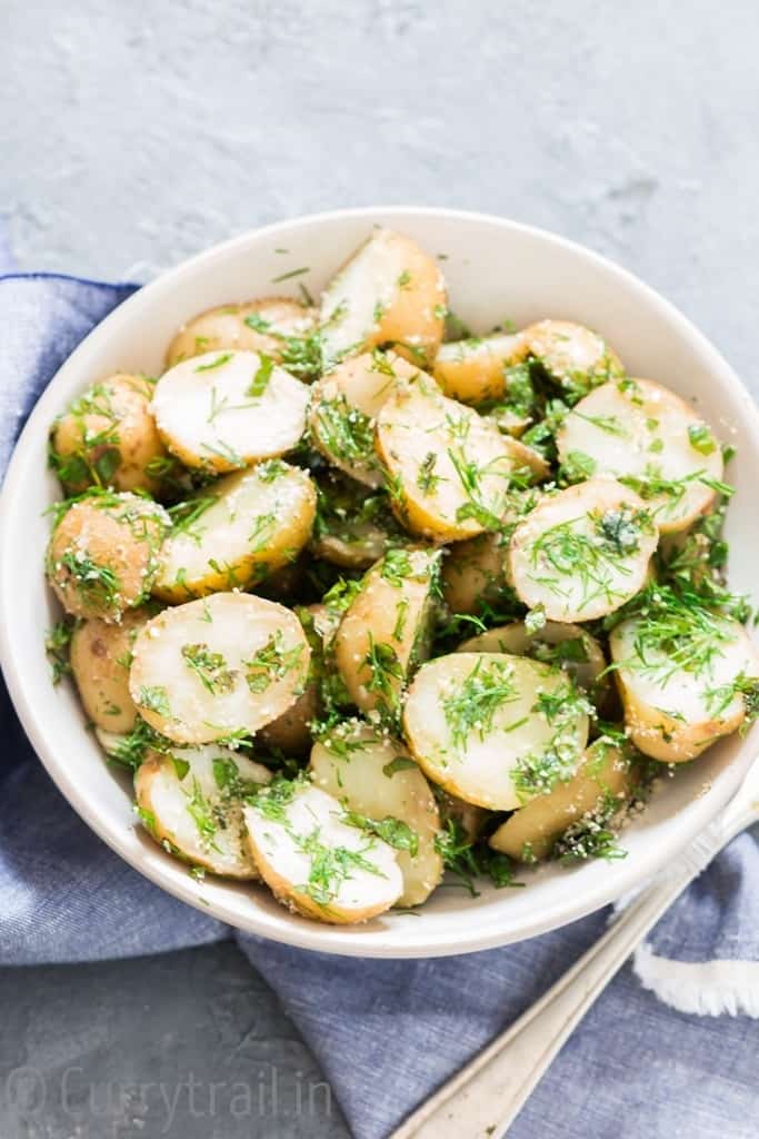 no mayo easy potato salad with herbs served in a bowl