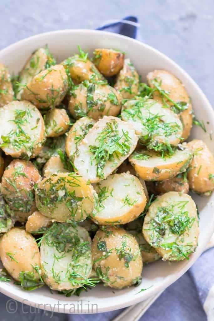 no mayo easy potato salad with herbs served in a bowl