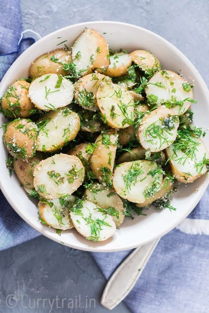 no mayo easy potato salad with herbs served in a bowl