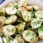 no mayo easy potato salad with herbs served in a bowl