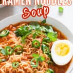 spicy ramen noodles soup with soft boiled egg in a bowl with text