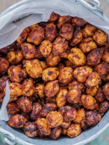 baked chickpeas with spices in a snack bucket.