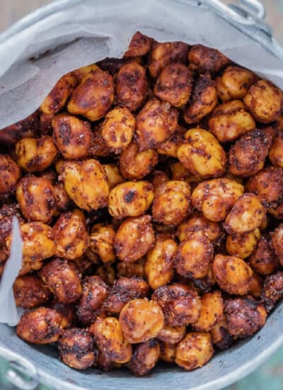 baked chickpeas with spices in a snack bucket.