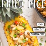 pineapple fried rice served in pineapple bowl with text overlay