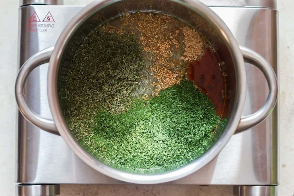 rice and seasoning in saucepan