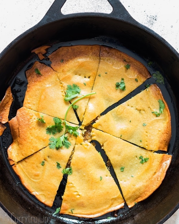 one ingredients socca flatbread cooked in cast iron skillet