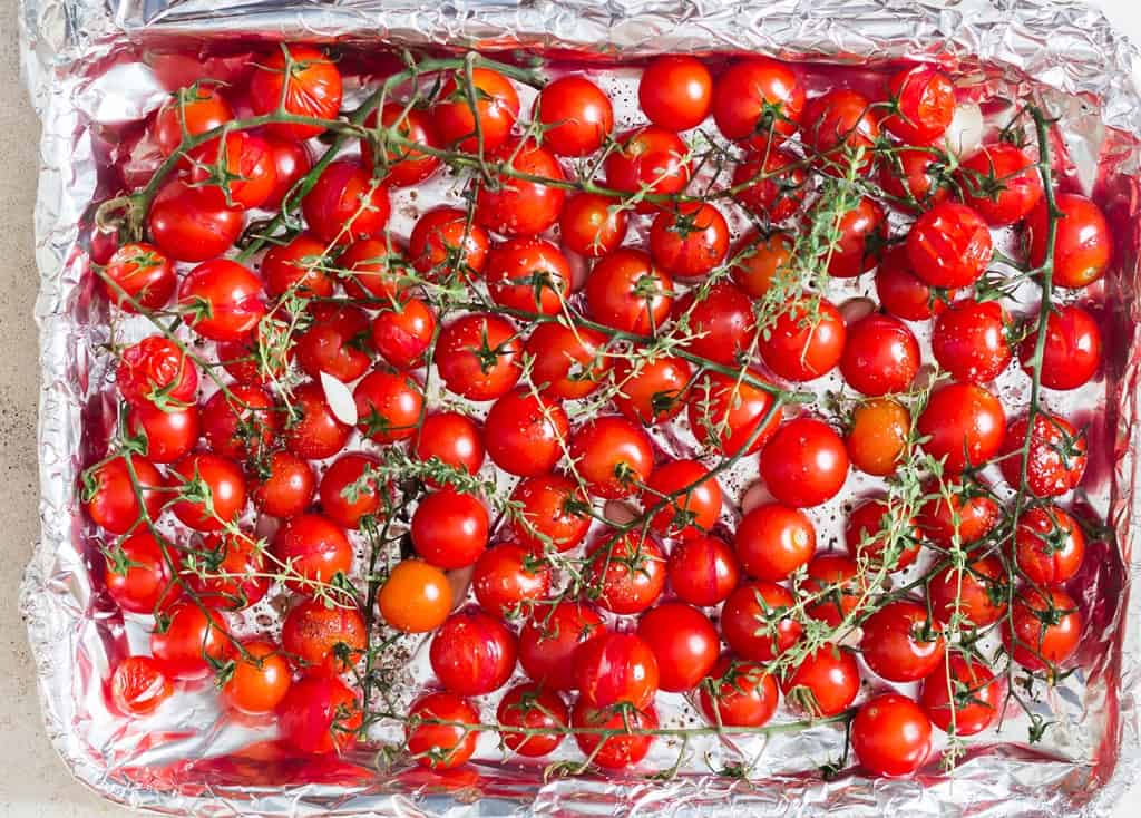 Roasted cherry tomatoes in baking tray