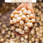spatula with chickpeas cooked in instant pot with text overlay