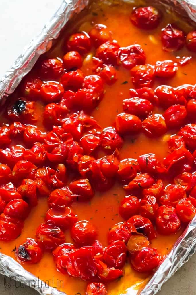 Roasted cherry tomatoes in baking tray