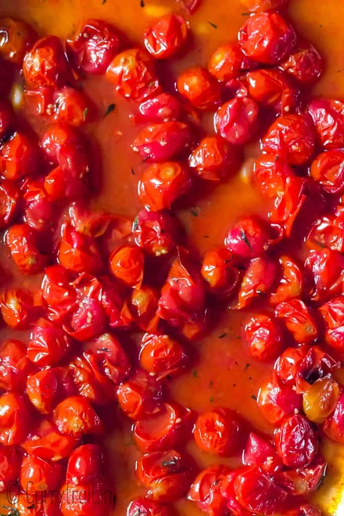 Roasted cherry tomatoes in baking tray