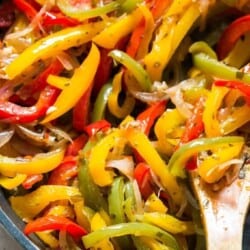 sauteed peppers and onions in a skillet