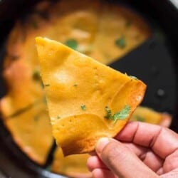 one ingredients socca flatbread cooked in cast iron skillet