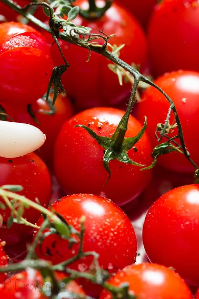 roasting cherry tomatoes on vein in baking tray