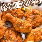 crispy southern fried chicken in plate with text