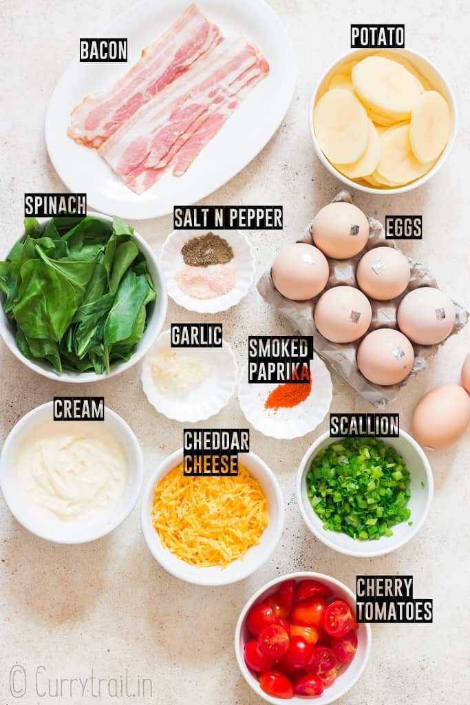all ingredients needed to make egg frittata arranged on a board