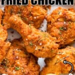 ultra crispy fried chicken in plate with text overlay
