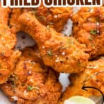 ultra crispy fried chicken in plate with text overlay