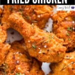 crispy juicy southern fried chicken in plate with text overlay